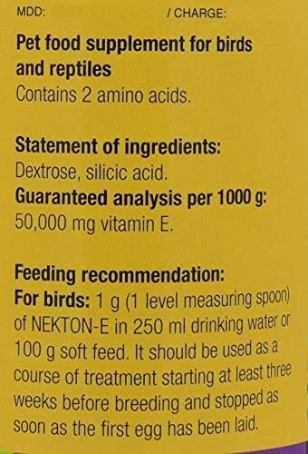 Pet food supplement label for birds and reptiles with ingredients and feeding recommendations.